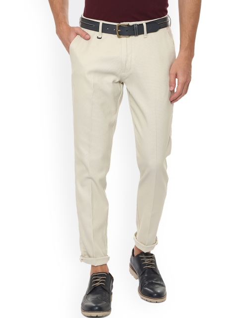 

Louis Philippe Men Beige Slim Fit Self Design Regular Trousers