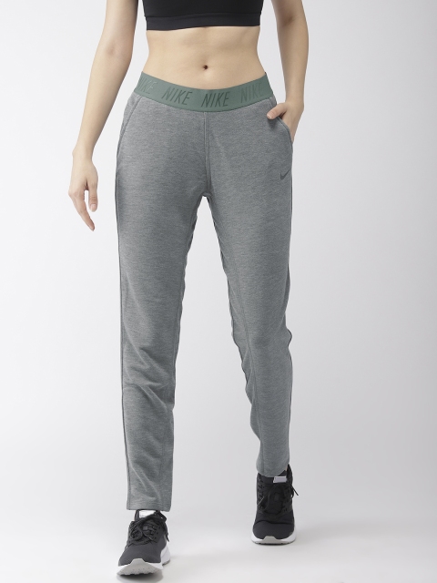 

Nike Women Grey Solid DRY-FIT TAPERED NFS Track Pants