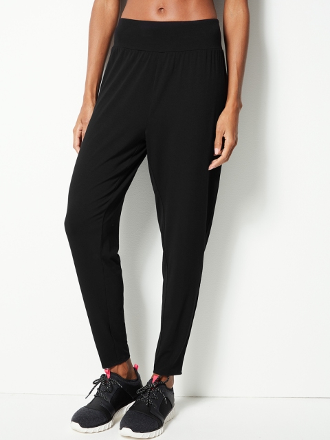 

Marks & Spencer Women Black Solid Tapered-Fit Track Pants