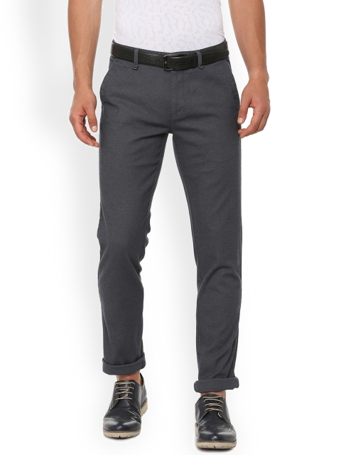 

Van Heusen Men Blue Slim Fit Self Design Regular Trousers