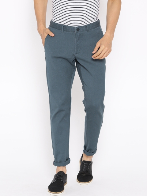 

Blackberrys Men Teal Blue Self-Design Sharp Regular Fit Trousers