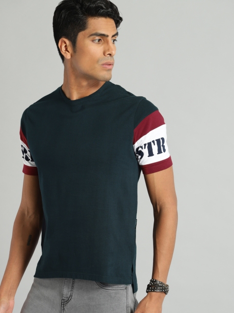 

Roadster Men Navy Blue Solid Round Neck Pure Cotton T-shirt