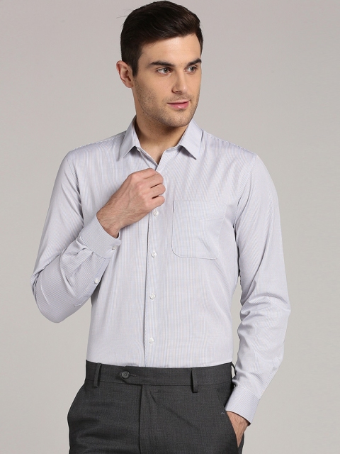 

Peter England Men Blue & Black Slim Fit Striped Formal Shirt