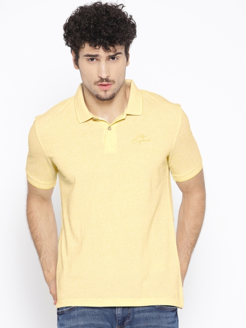 

Peter England Casuals Men Yellow Solid Polo Collar T-shirt
