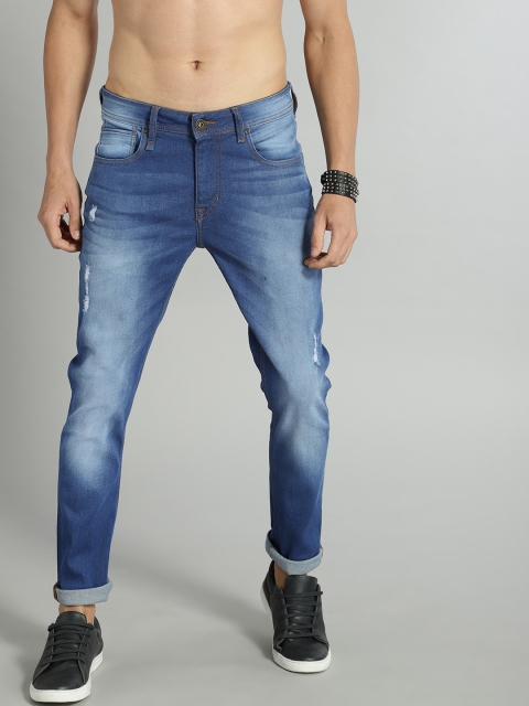

The Roadster Lifestyle Co Men Blue Premium Vintage Mildly Distressed Skinny Fit Mid-Rise Stretchable Jeans