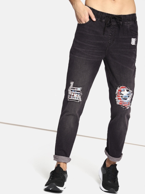 

Kook N Keech Men Black Slim Jogger Fit Mid-Rise Mildly Distressed Stretchable Jeans