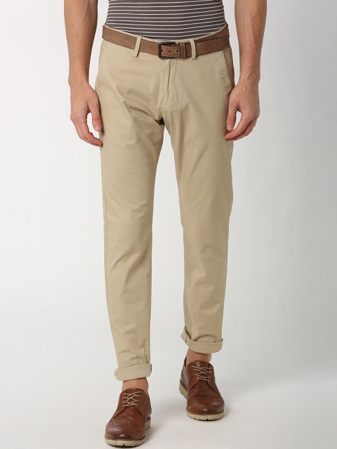 

Peter England Casuals Men Brown Slim Fit Self Design Regular Trousers