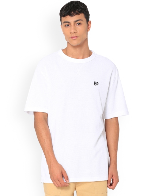 

Puma Men White Solid Round Neck T-shirt