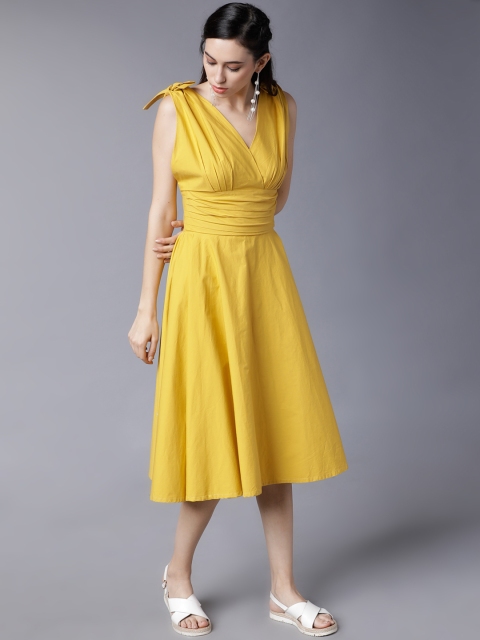 

Tokyo Talkies Women Yellow Solid Empire Dress