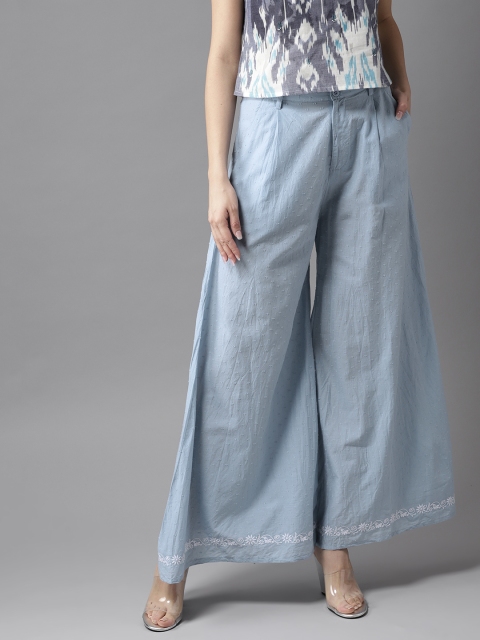

Moda Rapido Women Blue Self Design Flared Palazzos