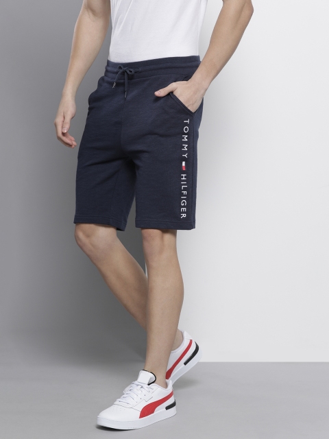 

Tommy Hilfiger Men Navy Blue Brand Logo Printed Regular Shorts