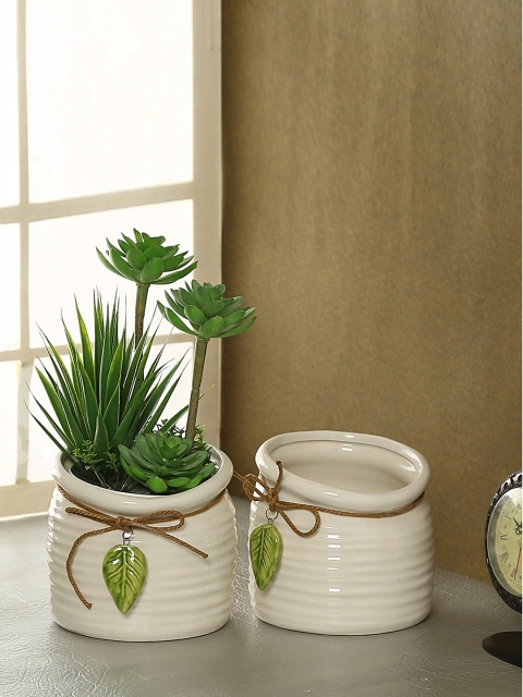 

Aapno Rajasthan Set of 2 White Ceramic Flower Vases