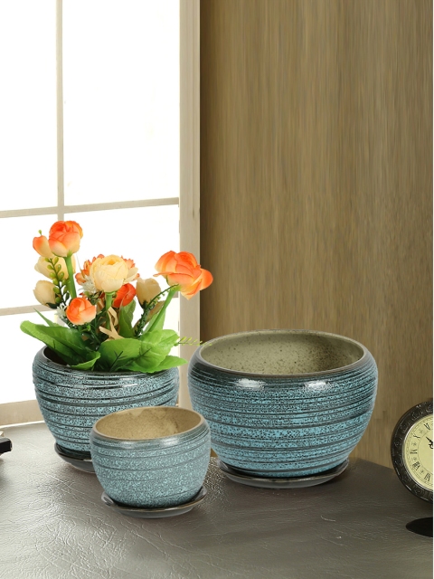 

Aapno Rajasthan Set of 3 Teal Blue Ceramic Flower Vases