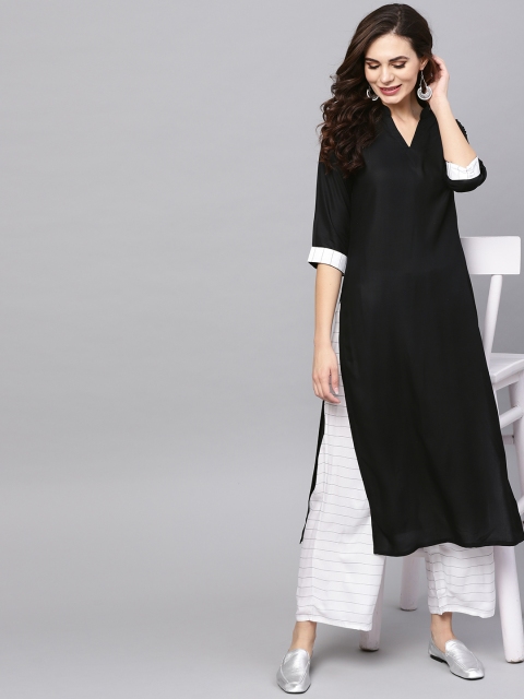 

Libas Women Black Solid Kurta with Palazzos