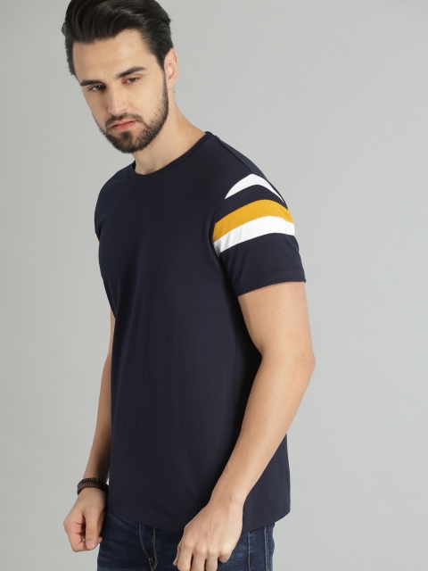 

Roadster Men Navy Blue Solid Round Neck T-shirt