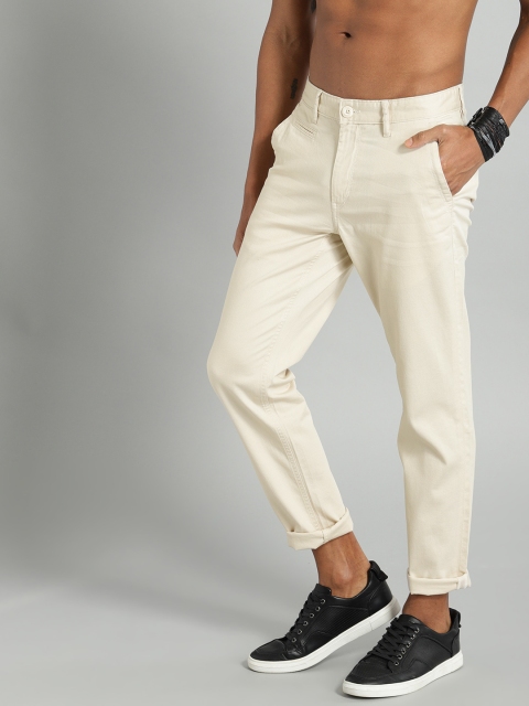 

The Roadster Lifestyle Co Men Beige Regular Fit Solid Regular Trousers