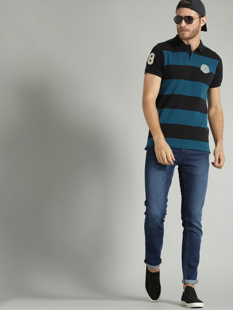 

Roadster Men Black & Teal Blue Striped Polo Collar T-shirt