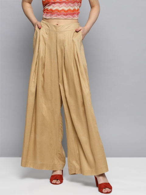 

Ritu Kumar Women Beige Wide Leg Solid Palazzos