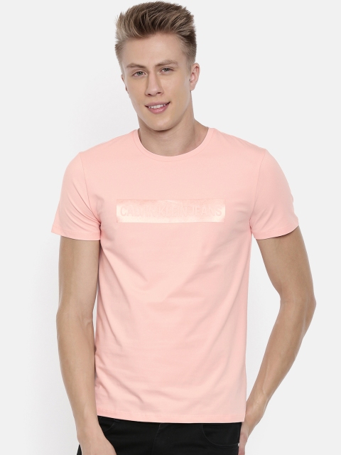 

Calvin Klein Jeans Men Pink Solid Round Neck T-shirt