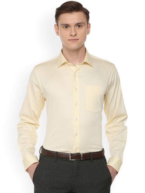 

Van Heusen yellow Men Regular Fit Solid Formal Shirt