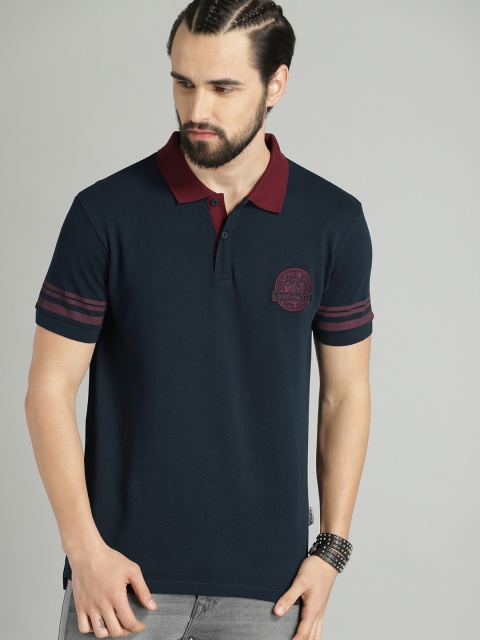 

Roadster Men Navy Blue Solid Polo Collar T-shirt