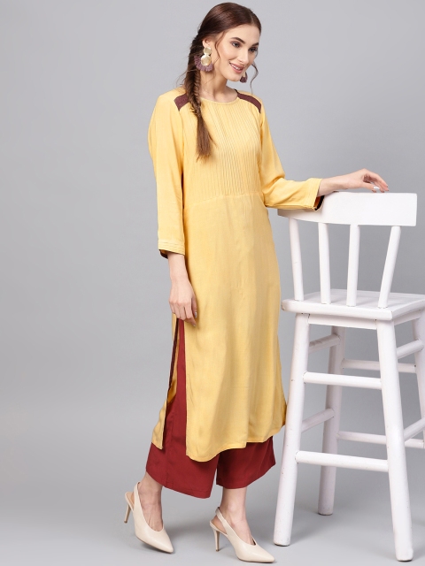 

Jaipur Kurti Women Yellow Solid Straight Kurta