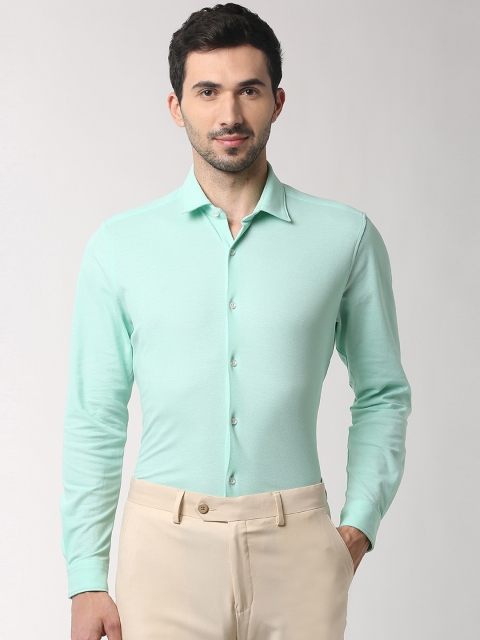 

Peter England Men Green Slim Fit Solid Formal Shirt