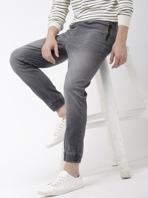 

Mast & Harbour Men Grey Mid-Rise Clean Look Stretchable Regular Fit Jogger Jeans