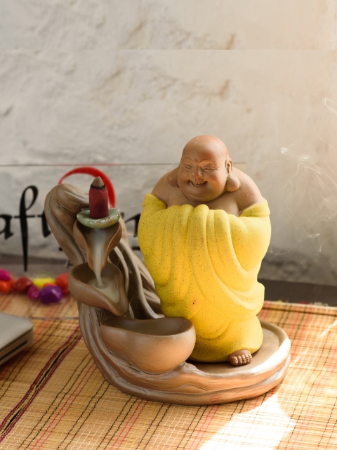 

eCraftIndia Yellow & Brown Buddha Smoke Fountain Showpiece