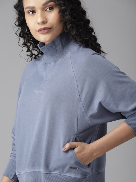 

Roadster Women Blue Solid Sweatshirt