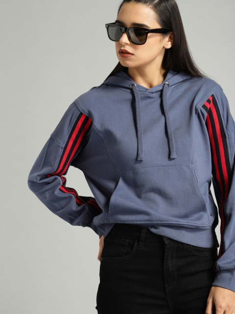 

Roadster Women Blue Solid Hooded Sweatshirt