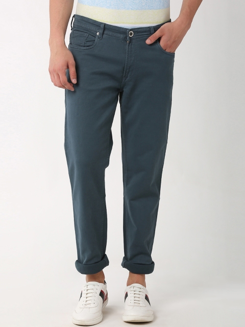 

Peter England Casuals Men Navy Blue Slim Fit Solid Regular Trousers