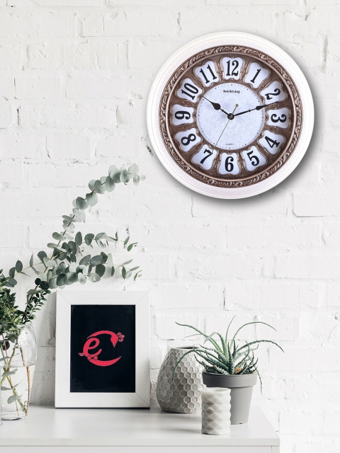 

eCraftIndia Gold-Toned Round Printed Analogue Wall Clock