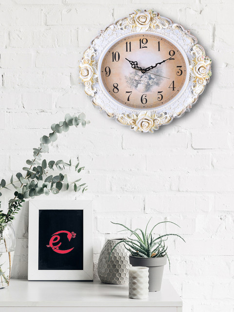 

eCraftIndia White Oval Printed Analogue Wall Clock