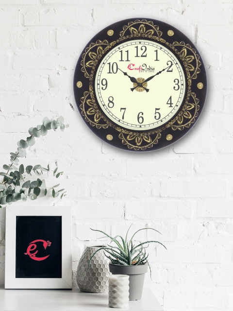 

eCraftIndia Gold-Toned & Black Handcrafted Round Textured Analogue Wall Clock