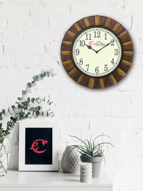 

eCraftIndia Cream-Coloured Handcrafted Round Solid Analogue Wall Clock