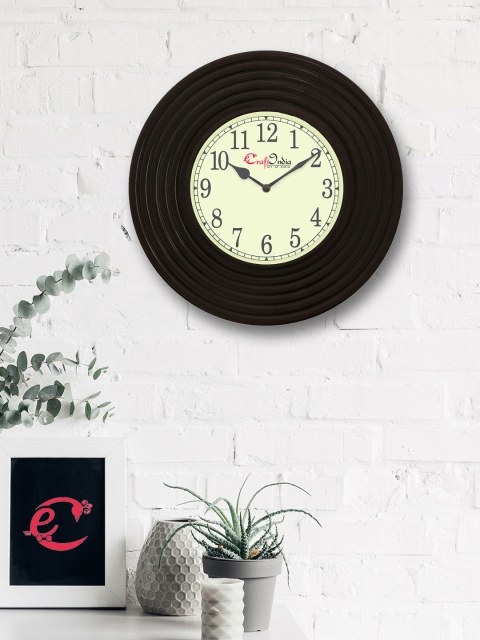 

eCraftIndia Black Handcrafted Round Solid Analogue Wall Clock