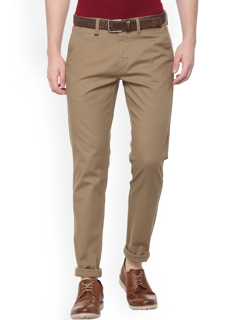 

Van Heusen Men Brown Slim Fit Self Design Regular Trousers