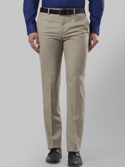 

Raymond Men Beige Regular Fit Self Design Formal Trousers