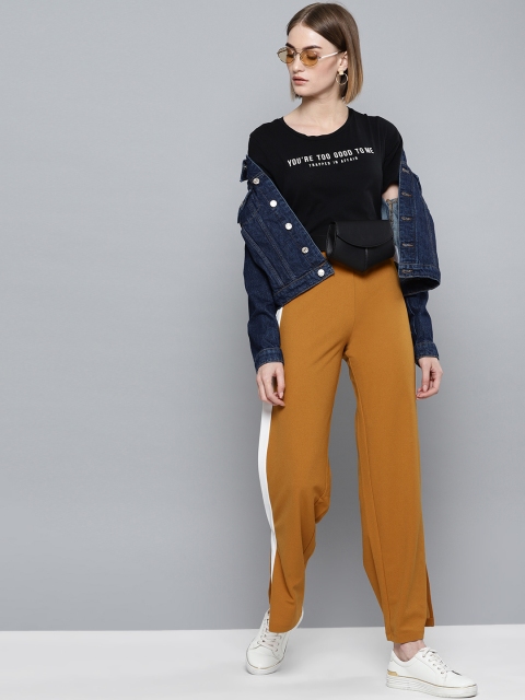 

Harpa Women Mustard Smart Regular Fit Solid Parallel Trousers