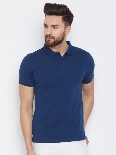 

Okane Men Blue Solid Polo Collar T-shirt