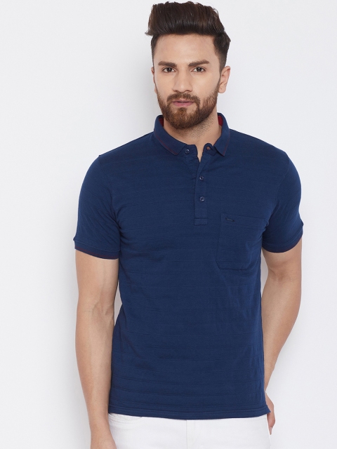 

Okane Men Navy Blue Solid Polo Collar T-shirt