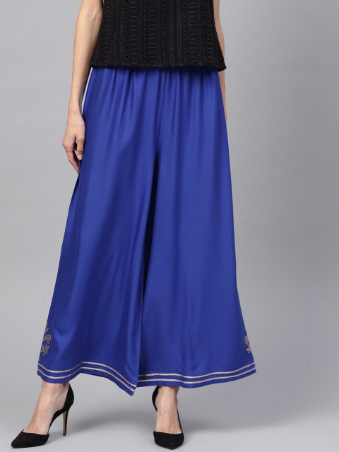 

PINKSKY Women Blue Flared Solid Palazzos