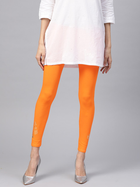 

PINKSKY Women Orange Foil Print Detail Ankle-Length Leggings