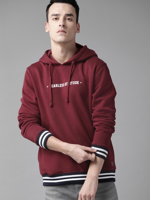 

Roadster Men Maroon Solid Hooded Sweatshirt