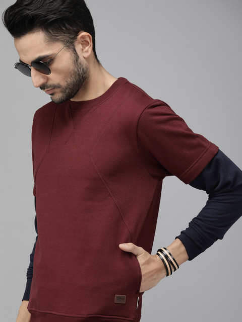 

The Roadster Lifestyle Co Men Maroon Solid Sweatshirt
