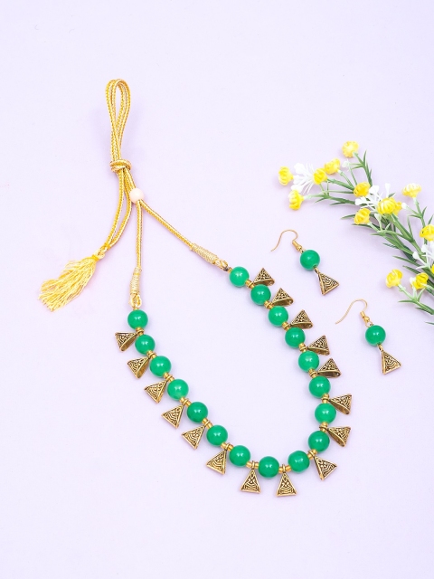 

Golden Peacock Green Beads Jeweller Set