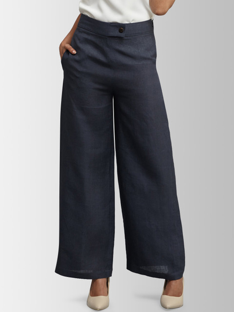 

FableStreet Women Blue Flared Solid Parallel Trousers