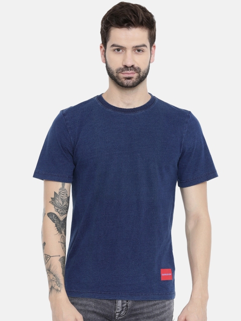 

Calvin Klein Jeans Men Navy Blue Solid Round Neck T-shirt