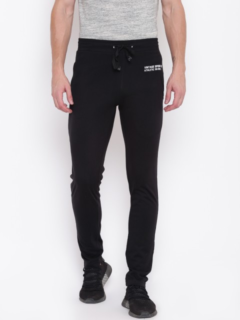 

Sweet Dreams Men Black Solid Track Pants